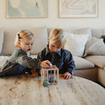 Boîte à formes avec élastiques | Mushie