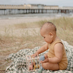 Boîte à formes avec élastiques | Mushie