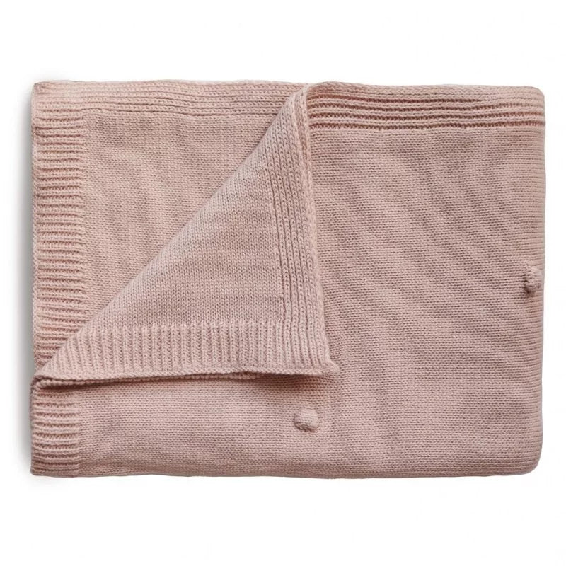 Couverture tricotée "blush"